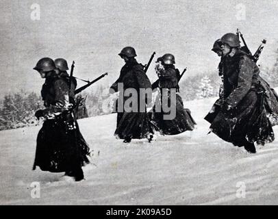 Soldats allemands travaillant sur la ligne Siegfried. La ligne Siegfried était une ligne défensive allemande construite en 1930s en face de la ligne Maginot française. Il s'étendait à plus de 630 km de Kleve à la frontière avec les pays-Bas, le long de la frontière occidentale de l'ancien empire allemand, jusqu'à la ville de Weil am Rhein à la frontière avec la Suisse - et comportait plus de 18 000 bunkers, tunnels et pièges à chars. De septembre 1944 à mars 1945, la ligne Siegfried a fait l'objet d'une offensive à grande échelle des alliés. Banque D'Images