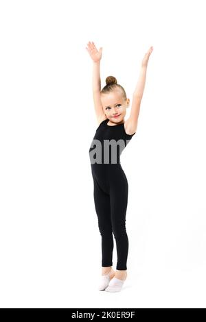 Jolie petite fille de gymnaste en léopard noir Banque D'Images