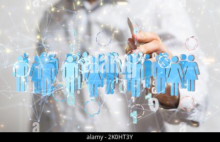 Un homme debout avec un stylo contre les icônes de personnes illustrées bleues Banque D'Images