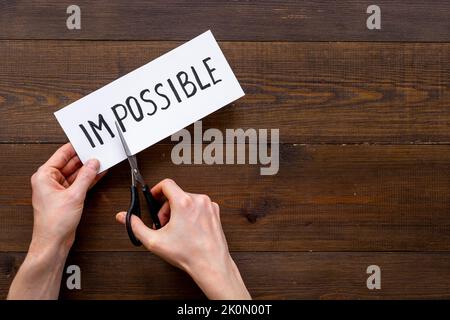 Le mot impossible devient possible. Concept de motivation Banque D'Images