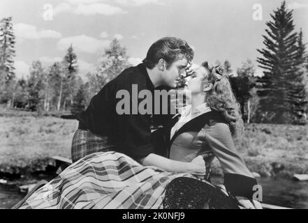 Robert Paige, Deanna Durbin, sur le plateau du film, « CAn't Help Singing », Universal Pictures, 1944 Banque D'Images