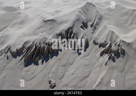 Structures de sable abstraites complexes créées par le vent Banque D'Images