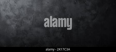 Fond noir ou gris foncé de texture de mur ou de pierre rugueuse ou de béton. Banque D'Images