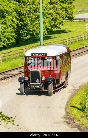 1933 vintage maroon red Crossville 716 motor services single decker Leyland Cub bus at Beamish County Durham Beamish open air museum county durham Stock Photo