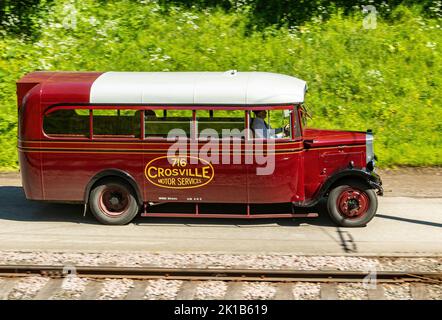 1933 vintage maroon red Crossville 716 motor services single decker Leyland Cub bus at Beamish County Durham Beamish open air museum county durham Stock Photo