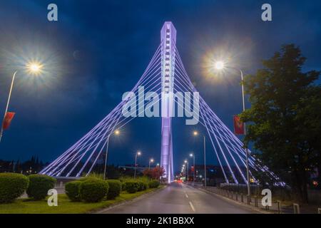 Podgorica, Montenegro - June 4, 2022: Illuminated Millennium Bridge at night. Banque D'Images