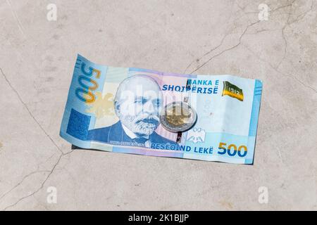 Albanian lek banknote and coin. Official currency of Albania. Stock Photo