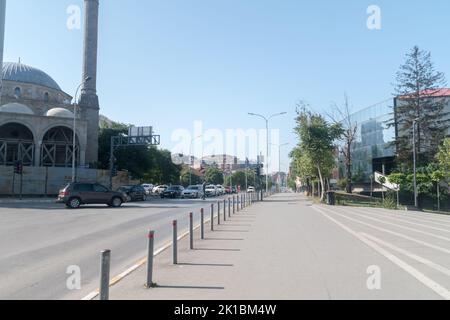 Pristina, Kosovo - June 5, 2022: Agim Ramadani street view in city centre of Prishtina. Stock Photo