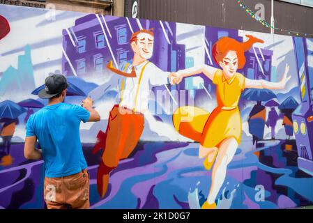 Southend City Jam. Artistes de rue affichant leurs compétences dans 60 endroits autour du centre-ville. L'artiste masculin Tristan Menard au travail. Banque D'Images