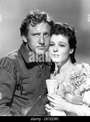 SPENCER TRACY en tant que major Robert Rogers et RUTH HUSSEY Publicité Portrait de CLARENCE SINCLAIR BULL dans NORTHWEST PASSAGE (Book One - Rogerss' Rangers)1940 réalisateur LE ROMAN DU ROI-VID Kenneth Roberts musique Herbert Stothart producteur Hunt Stromberg Metro Goldwyn Mayer Banque D'Images