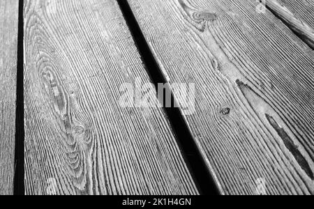 Ancien parquet en bois de chêne rugueux, photo d'arrière-plan noir et blanc avec mise au point sélective Banque D'Images