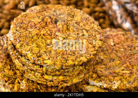 Traditional mexican candy sweet Palanqueta with peanuts and amaranto seeds covered wiith caramel. Stock Photo
