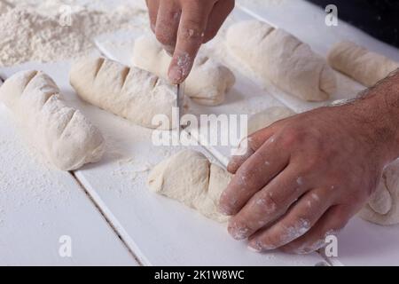 Pâte préparer du pain à la main Banque D'Images