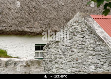 A close up of an Irish stone cottage in western Ireland. Stock Photo