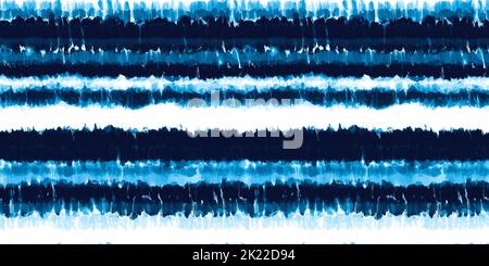 Seamless Hand Drawn Speckled Loose Watercolor Tie dye Ombre Shibori Stripes pattern in Indigo Blue and White. High resolution textile background textu Stock Photo