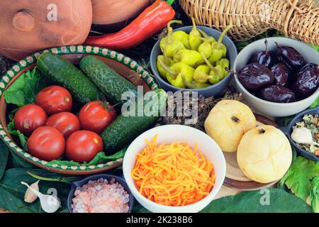 Various fermented food in bowls. Set of marinated products. Healthy food. Pickled vegetables. Stock Photo