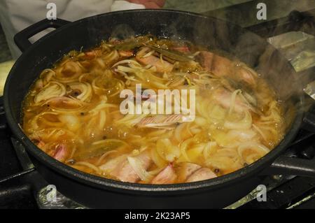 Pickled tuna, cooking over low heat Stock Photo