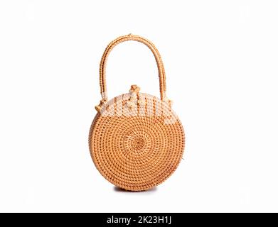 Modern stylish round straw bag isolated on the white background Stock Photo