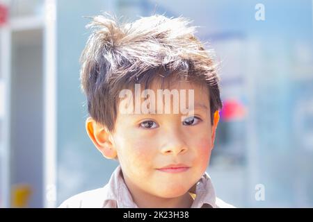 La Paz, Bolivia - September 11 2022: Portrait of a Little Boy Staring at the Camera Stock Photo