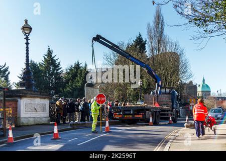 Local campaigners and council officers watch as a sample anti-suicide fence panel is installed on Hornsey Lane bridge in North London, UK Stock Photo