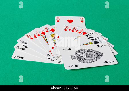 A typical hand in a game of contract bridge, the fourth highest of the longest suit being a conventional lead for the opponents Stock Photo