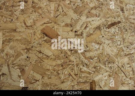 Panneau de particules - gros plan du mur de bâtiment en bois pressé Banque D'Images