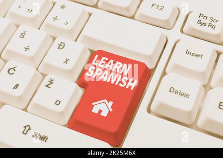 Panneau écrit à la main apprendre l'espagnol. Mot écrit sur le langage de traduction en Espagne Vocabulaire dialecte Discours Résumé présentant le Hacker éthique, en tapant des notes créatives et des idées Banque D'Images