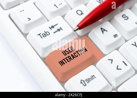 Texte d'écriture interaction utilisateur. Photo conceptuelle comment le client agit sur le système et vice versa développement d'un nouveau site Web interactif, modification des codes de programmation Banque D'Images