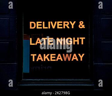 Delivery and late night takeaway neon food sign Glasgow, Scotland, UK Stock Photo