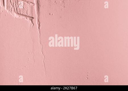 Arrière-plan cosmétique, texture argile.Masque rose argile sèche pour le visage et le corps Banque D'Images