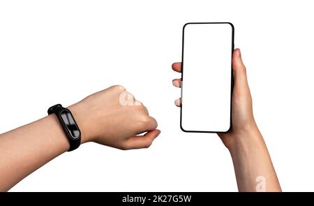 Hands with fitness tracker and phone mockup isolated on white background. Application for connecting watches to smartphone. High quality photo Stock Photo