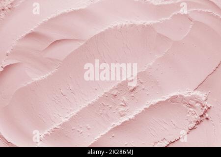 Arrière-plan cosmétique, texture argile.Masque rose argile sèche pour le visage et le corps Banque D'Images