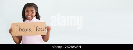Panneau de remerciement pour la tenue d'une fille africaine Banque D'Images
