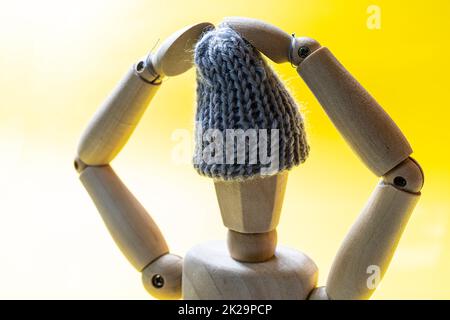 Mannequin avec une casquette en laine Banque D'Images