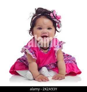 Toute la cutitude. Photo studio d'une adorable petite fille isolée sur blanc. Banque D'Images