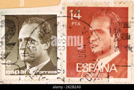 Photo of two Spanish postage stamps grey 6 pesetas and orange 14 pesetas featuring an image of King Juan Carlos I Stock Photo