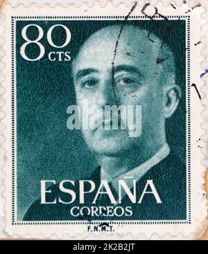 Photo of a green 80 centimos Spanish postage stamp featuring an image of Francisco Franco Bahamonde from 1955 Stock Photo