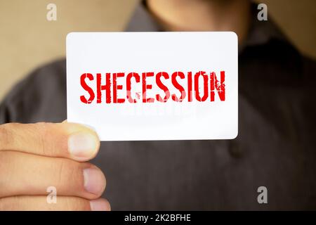 text on gray word secession in small wooden letters with black font on a blue background Stock Photo