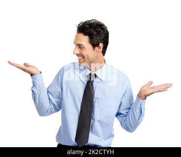 S'exprimant dans le monde des affaires. Un beau homme d'affaires souriant isolé sur blanc. Banque D'Images