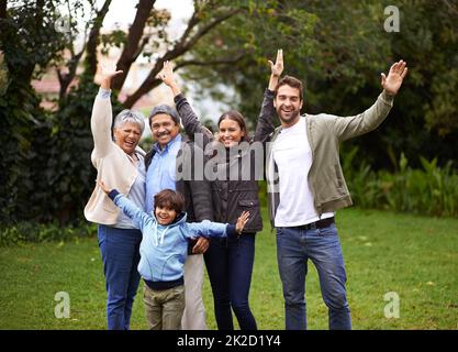 Having fun as a family. Portrait of a multi-generational family having fun in the outdoors. Banque D'Images