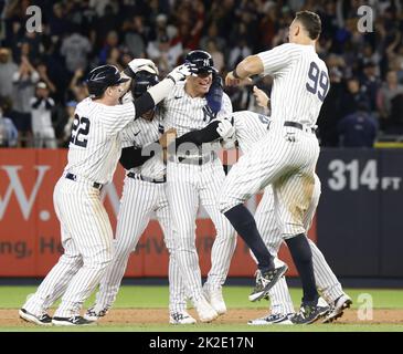 New York City, United States. 22nd Sep, 2022. New York Yankees celebrate after Josh Donaldson (C) hit an rbi walk off single to give the Yankees a 5-4 win over the Boston Red Sox at Yankee Stadium in New York City on Thursday, September 22, 2022. The victory sends the Yankees into the post-season playoffs. Photo by John Angelillo/UPI Credit: UPI/Alamy Live News Stock Photo