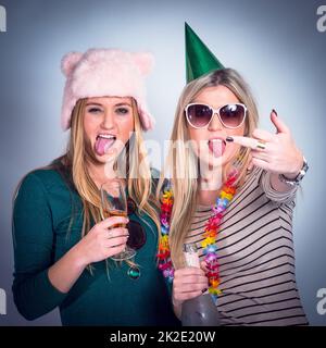 Young, wild and free. Real party of guys and girls getting drunk. Stock Photo