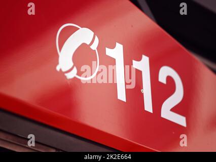 Karlsruhe, Germany. 19th July, 2022. At the Competence Center Aerial Rescue of the fire equipment manufacturer Rosenbauer, the lettering for the emergency number 112 is attached to a fire truck. The Austrian company Rosenbauer is one of the world's largest manufacturers of fire fighting vehicles. Credit: Uli Deck/dpa/Alamy Live News Stock Photo