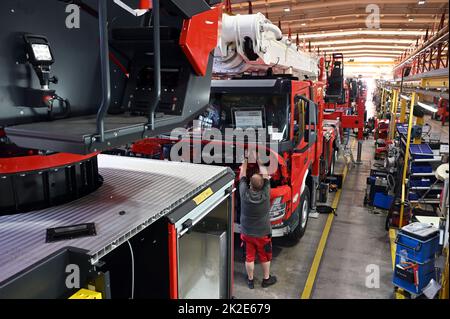 Karlsruhe, Germany. 19th July, 2022. At the Competence Center Aerial Rescue of the fire equipment manufacturer Rosenbauer, firefighting vehicles stand in an assembly hall during body construction. The Austrian company Rosenbauer is one of the world's largest manufacturers of fire fighting vehicles. Credit: Uli Deck/dpa/Alamy Live News Stock Photo