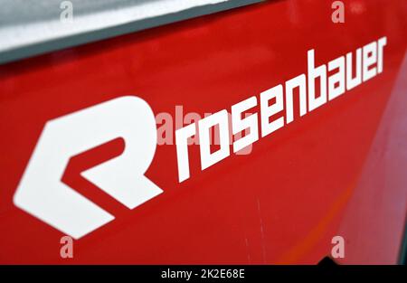 Karlsruhe, Germany. 19th July, 2022. At the competence center for aerial rescue of the fire equipment manufacturer Rosenbauer, the lettering 'Rosenbauer' is affixed to a fire truck. The Austrian company Rosenbauer is one of the world's largest manufacturers of fire fighting vehicles. Credit: Uli Deck/dpa/Alamy Live News Stock Photo