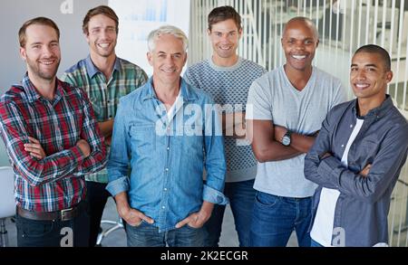 None of us is as smart as all of us. A group of colleagues together. Stock Photo