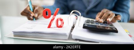 Pourcentage de l'impôt sur les sociétés et du taux d'intérêt Banque D'Images