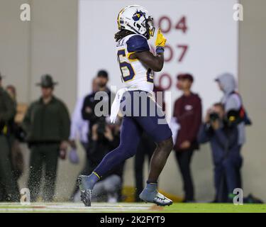 September 22, 2022: West Virginia Mountaineers running back Justin Johnson Jr. (26) celebrates a touchdown during the NCAA football game between the West Virginia Mountaineers and the Virginia Tech Hokies at Lane Stadium in Blacksburg, Virginia. Greg Atkins/CSM Stock Photo