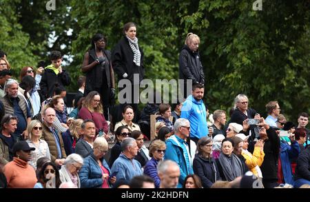 People fall silent at The Albert Memorial during the two minute silence. The State Funeral of Queen Elizabeth II, held today (September 19, 2022) in Westminster Abbey. The country is still officially mourning Queen Elizabeth II, who has been succeeded by King Charles III. Queen Elizabeth II died on September 8, 2022, whilst staying at Balmoral Castle in Scotland. Stock Photo