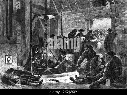 Un bain de morts et de blessés amené à la surface après la catastrophe à la mine de charbon Jabin, à Treuil, Saint-Etienne, France. En arrière-plan, des parents anxieux attendent des nouvelles des victimes. Le 4 février 1876 et l'explosion d'un gaz inflammable humide, le méthane, ont coûté la vie à 210 mineurs. De 'le Voleur', Paris, le 18 février 1876. Gravure. Banque D'Images